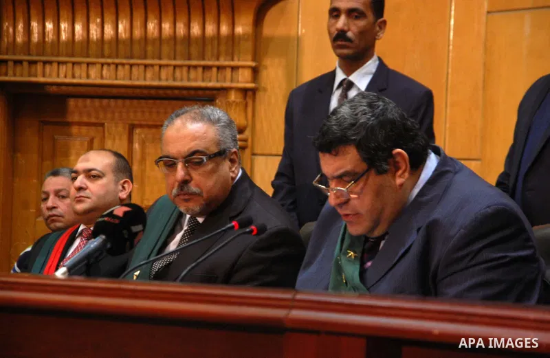 Egyptian judge Shaban el-Shamy reads out the verdict sentencing former Egyptian President Mohamed Mursi and other Muslim Brotherhood members at a court in the outskirts of Cairo, Egypt May 16, 2015. An Egyptian court on...
