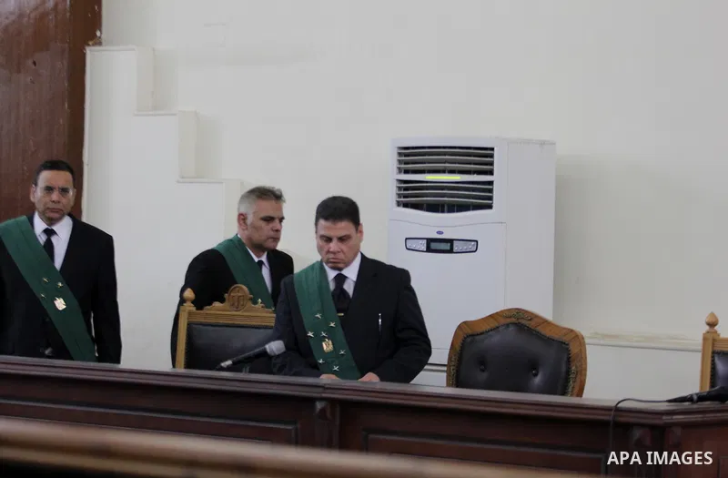 Judges attend the trial of Egyptian radical Islamist Mohammed al-Zawahiri, the brother of Al-Qaeda chief Ayman al-Zawahiri, at a court in Cairo on May 17, 2015. Photo by Amr Sayed