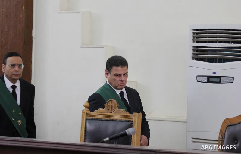 Judges attend the trial of Egyptian radical Islamist Mohammed al-Zawahiri, the brother of Al-Qaeda chief Ayman al-Zawahiri, at a court in Cairo on May 17, 2015. Photo by Amr Sayed