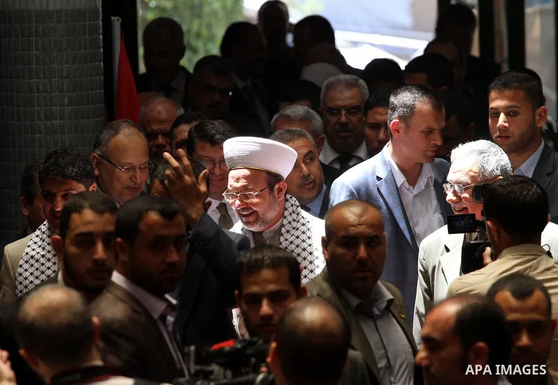 Turkish minister of religious affairs Muhammad Kurmazmore visits the Islamic University, in Gaza city on May 17, 2015. Photo by Mohammed Asad