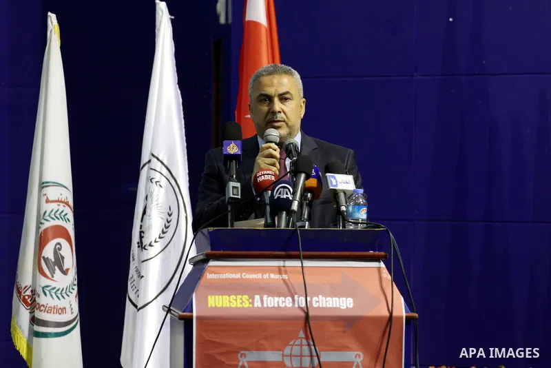 Senior Hamas leader Ismail Radwan speaks during the visit of Turkish minister of religious affairs Muhammad Kurmazmore to the Islamic University, in Gaza city on May 17, 2015. Photo by Mohammed Asad