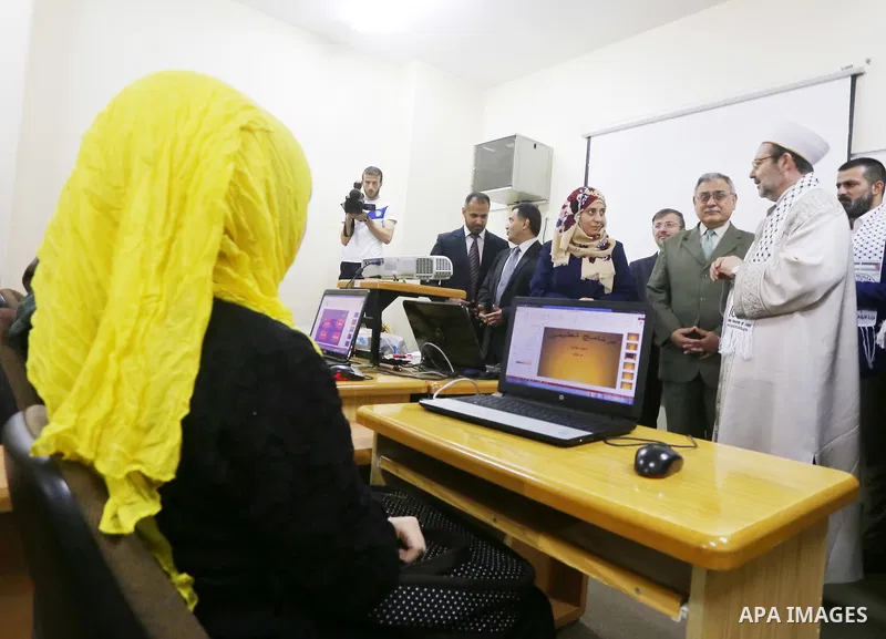 Turkish minister of religious affairs Muhammad Kurmazmore visits the Islamic University, in Gaza city on May 17, 2015. Photo by Mohammed Asad