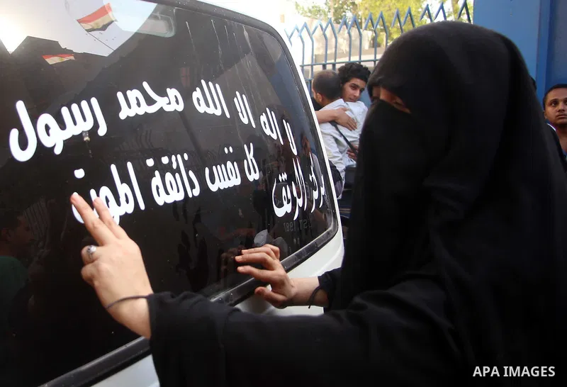 Relatives of executed members of Ansar Beit al-Maqdis, mourn outside a morgue, in Cairo on May 17, 2015. Egypt executed six men Sunday convicted of belonging to the Sinai-based militant group Ansar Beit al-Maqdis and con...