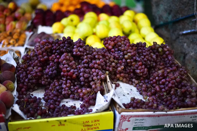Fruits are displayed at a street market in Ad Duqqi district, near Cairo on May 19, 2015. Egypt suspended a capital gains tax on Monday, sending shares soaring after a months-long downturn in which investors had complain...