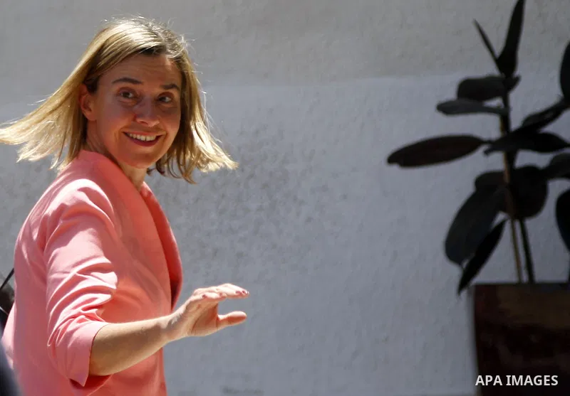 European Union foreign policy chief Federica Mogherini arrives to meet with Palestinian President Mahmoud Abbas at his headquarters in the West Bank city of Ramallah, on May 20, 2015. Mogherini is on a two-day official v...