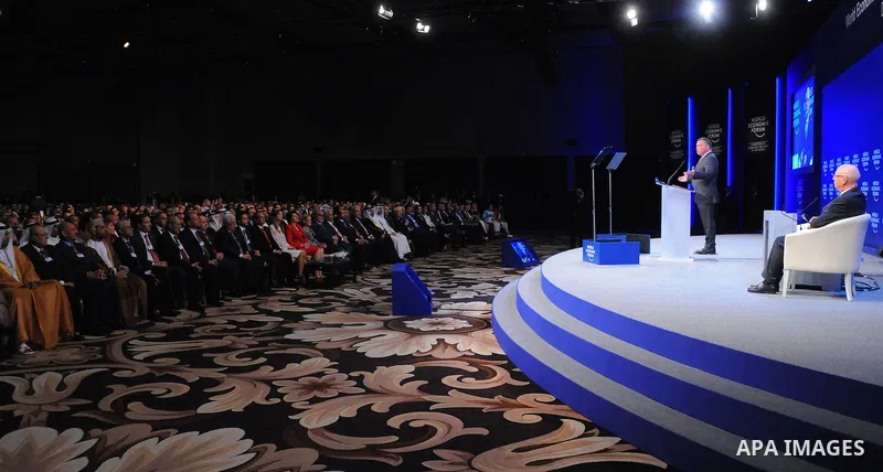 Egypt's President Abdel-Fattah el-Sissi attends the opening session as Jordan Kind Adullah II gives a speech during the World Economic Forum at the King Hussien convention center, Southern Shuneh, Jordan, May 22, 2015. A...