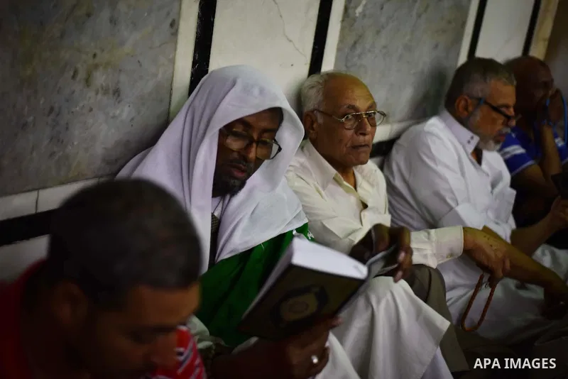 Egyptian worshippers attend a Mawlid al-Hussein, a religious celebration marking the birthday of the grandson of the Prophet Muhammad, in Cairo, Egypt, Tuesday, May 22, 2015. The celebration is one of the largest in Egyp...