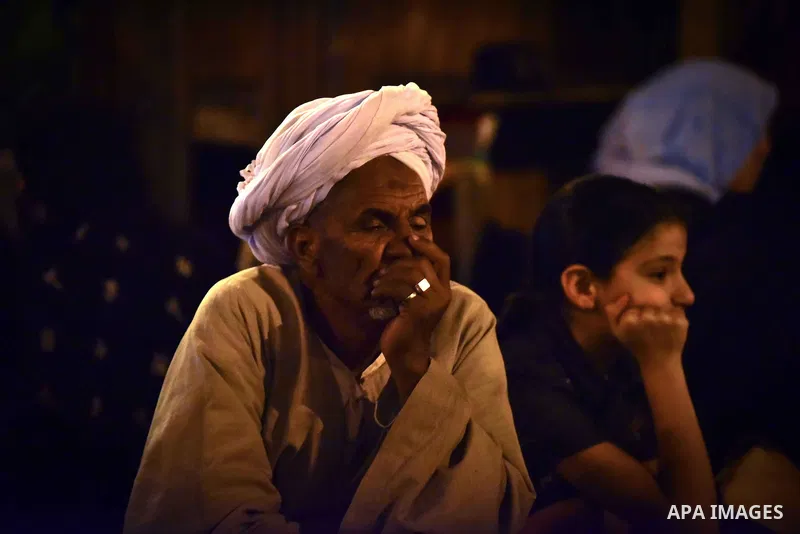 Egyptian worshippers attend a Mawlid al-Hussein, a religious celebration marking the birthday of the grandson of the Prophet Muhammad, in Cairo, Egypt, Tuesday, May 22, 2015. The celebration is one of the largest in Egyp...