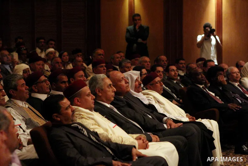 Participants listen to a speech during a conference at the Cairo hotel in the capital Cairo, on May 25, 2015. A four-day meeting of Libyan tribal leaders opened earlier in the day with the aim of exploring ways to unite...