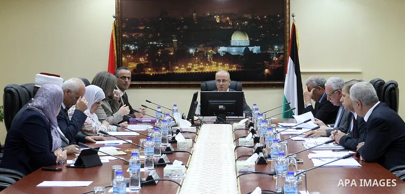 Palestinian Prime Minister Rami Hamdallah chairs a meeting of council of ministers in the West Bank city of Ramallah on May 26, 2015. Photo by Prime Minister Office