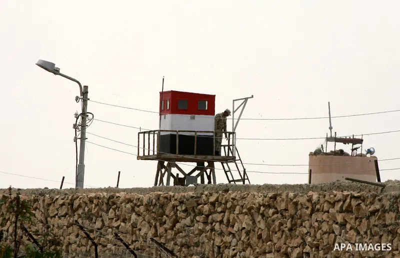 An Egyptian soldier stands guard on a tower on the Egyptian side of the Rafah border crossing between Egypt and southern Gaza Strip May 26, 2015. Egyptian authorities opened the Rafah crossing on Tuesday, for the first t...