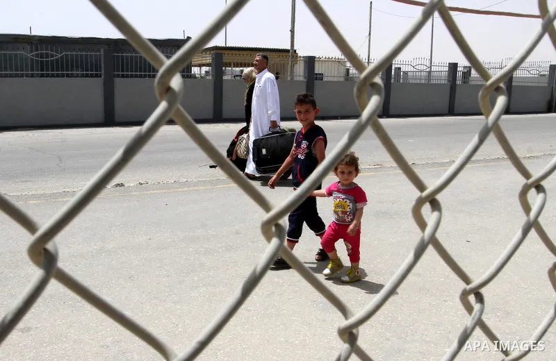 Palestinians arrive to the Gaza Strip through the Rafah border crossing between Egypt and the southern Gaza Strip May 27, 2015. Egyptian authorities opened the Rafah crossing on Tuesday and Wednesday, for the first time...