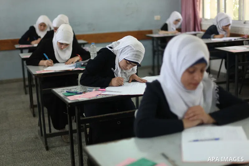 Palestinian female students sit for their final high school exams, known as "Tawjihi", in Gaza city on May 30, 2015. Nearly 81,000 Palestinian students sat for the first session of their high school exams seeking to obta...