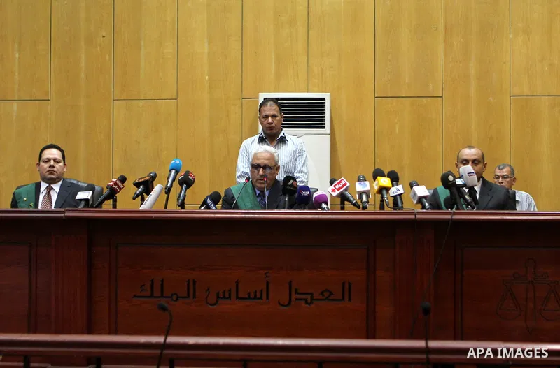 Egyptian Judges attend the trial of stadium riot in the canal city of Port Said that left 74 people dead on May 30, 2015 at the police academy in Cairo. The Egyptian court postponed its verdict to June 9, announced the j...