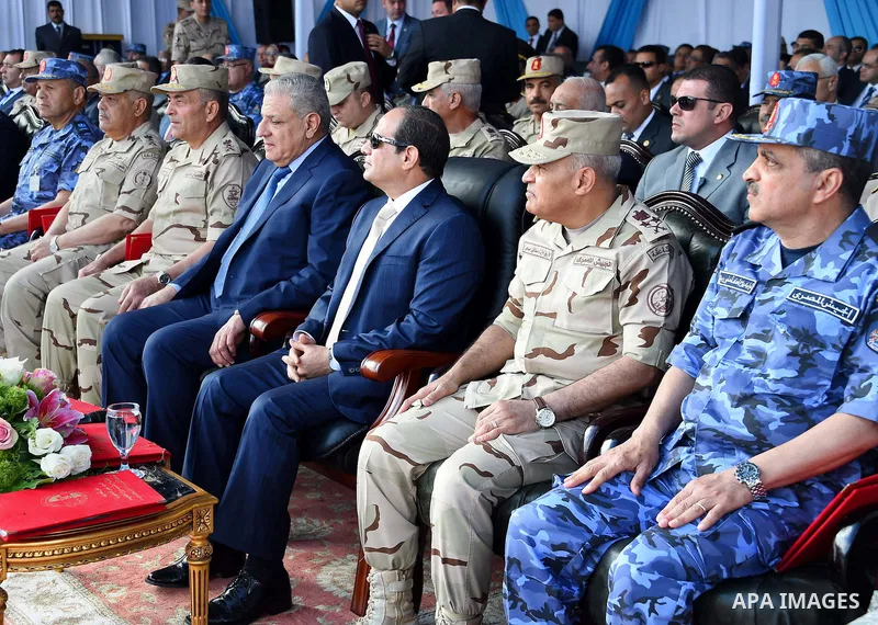 A handout picture provided by the Office of the Egyptian Presidency shows Egyptian President, Abdel Fattah al-Sisi attends the opening ceremony of Alexandria arsenal in Alexandria, Egypt on May 30, 2015. Photo by Egyptia...