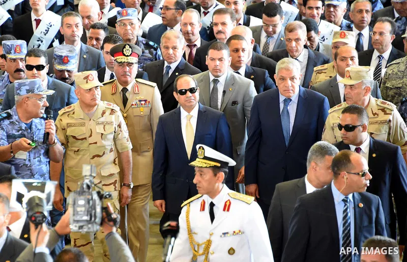 A handout picture provided by the Office of the Egyptian Presidency shows Egyptian President, Abdel Fattah al-Sisi attends the opening ceremony of Alexandria arsenal in Alexandria, Egypt on May 30, 2015. Photo by Egyptia...