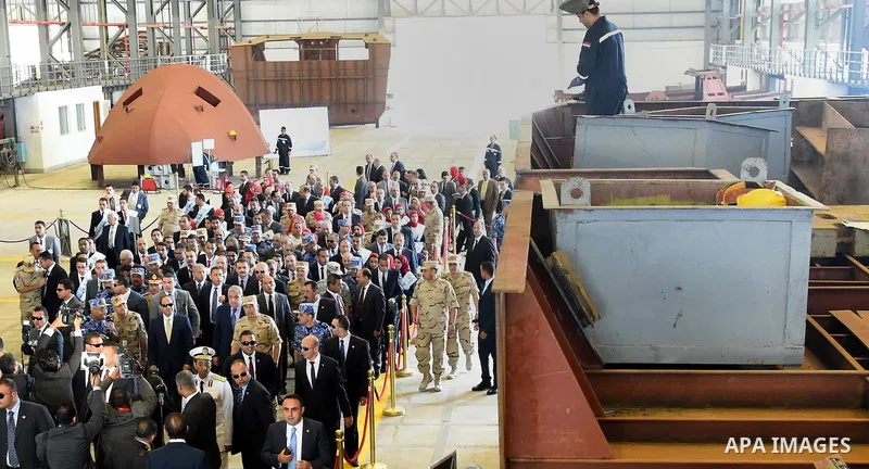A handout picture provided by the Office of the Egyptian Presidency shows Egyptian President, Abdel Fattah al-Sisi attends the opening ceremony of Alexandria arsenal in Alexandria, Egypt on May 30, 2015. Photo by Egyptia...
