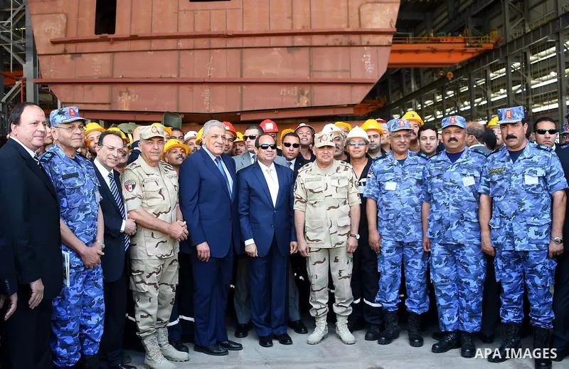 A handout picture provided by the Office of the Egyptian Presidency shows Egyptian President, Abdel Fattah al-Sisi attends the opening ceremony of Alexandria arsenal in Alexandria, Egypt on May 30, 2015. Photo by Egyptia...