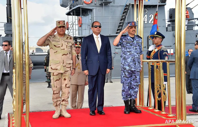 A handout picture provided by the Office of the Egyptian Presidency shows Egyptian President, Abdel Fattah al-Sisi attends the opening ceremony of Alexandria arsenal in Alexandria, Egypt on May 30, 2015. Photo by Egyptia...