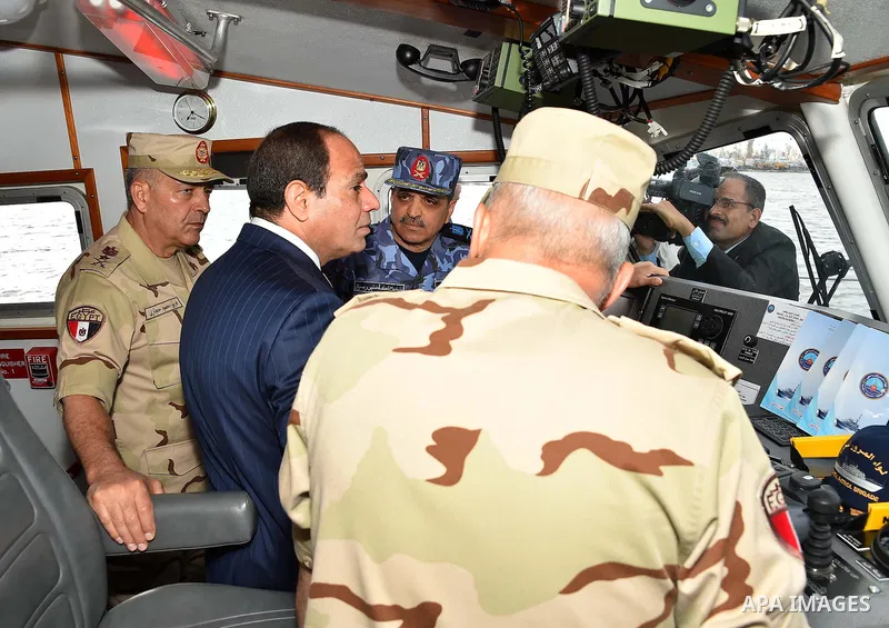 A handout picture provided by the Office of the Egyptian Presidency shows Egyptian President, Abdel Fattah al-Sisi attends the opening ceremony of Alexandria arsenal in Alexandria, Egypt on May 30, 2015. Photo by Egyptia...