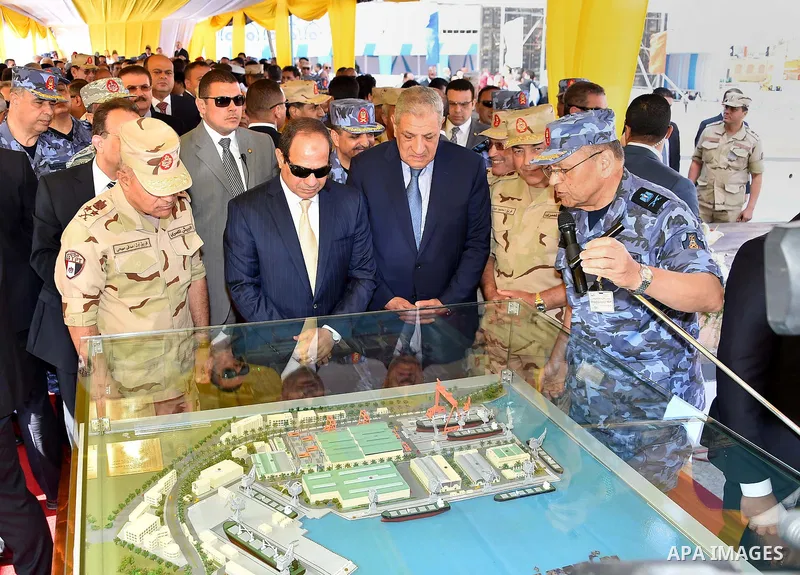 A handout picture provided by the Office of the Egyptian Presidency shows Egyptian President, Abdel Fattah al-Sisi attends the opening ceremony of Alexandria arsenal in Alexandria, Egypt on May 30, 2015. Photo by Egyptia...