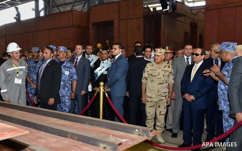 A handout picture provided by the Office of the Egyptian Presidency shows Egyptian President, Abdel Fattah al-Sisi attends the opening ceremony of Alexandria arsenal in Alexandria, Egypt on May 30, 2015. Photo by Egyptia...