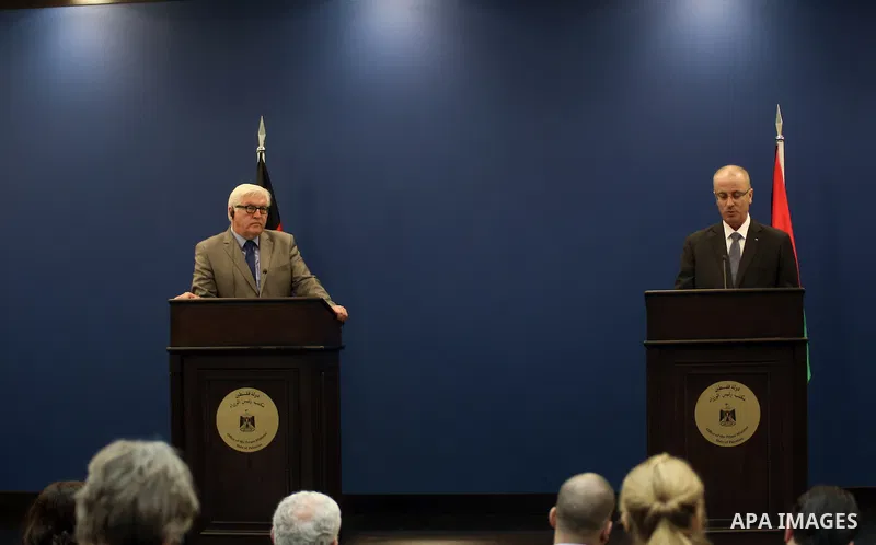 Palestinian Prime Minister Rami Hamdallah speaks during a press conference with German Foreign Minister Frank-Walter Steinmeier, in the West Bank City of Ramallah, 31 May 2015. Frank-Walter Steinmeier is on a two day vis...