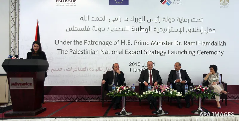 Palestinian Prime Minister Rami Hamdallah participates in a ceremony of the National Strategy for Export, in the West Bank City of Ramallah, on June 01, 2015. Photo by Prime Minister Office