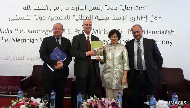 Palestinian Prime Minister Rami Hamdallah participates in a ceremony of the National Strategy for Export, in the West Bank City of Ramallah, on June 01, 2015. Photo by Prime Minister Office