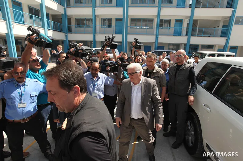 German Foreign Minister Frank-Walter Steinmeier visits a United Nations-run school in Gaza City, on June 1, 2015. Steinmeier is visiting the strip as part of a regional tour to assess peace prospects between Israelis and...