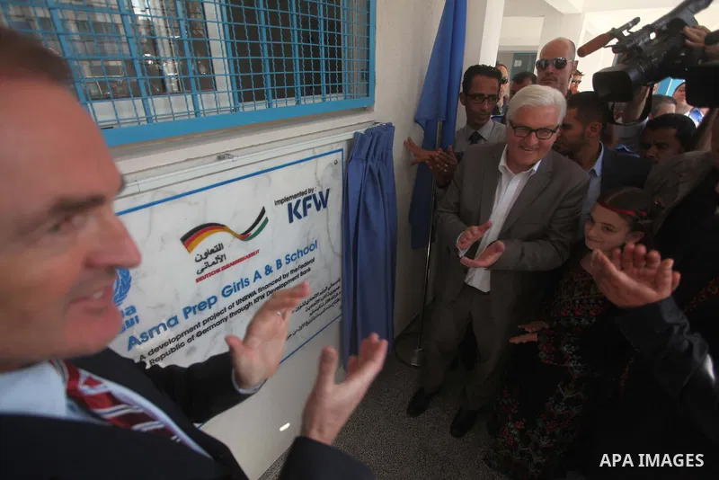 German Foreign Minister Frank-Walter Steinmeier visits a United Nations-run school in Gaza City, on June 1, 2015. Steinmeier is visiting the strip as part of a regional tour to assess peace prospects between Israelis and...