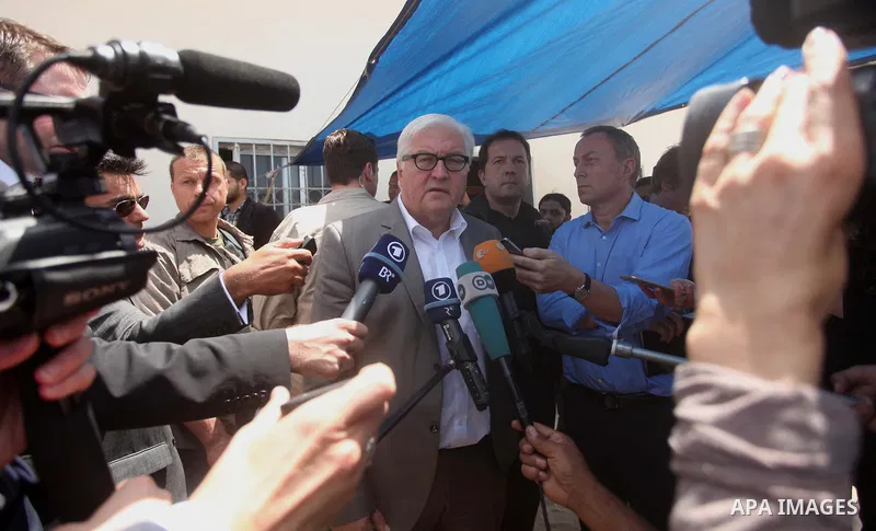 German Foreign Minister Frank-Walter Steinmeier speaks to media during his visit to destroyed rooms of Palestinian fishermen, damaged during Israeli Hamas conflict of 2014, in Gaza port, during his visit to Gaza City, 01...