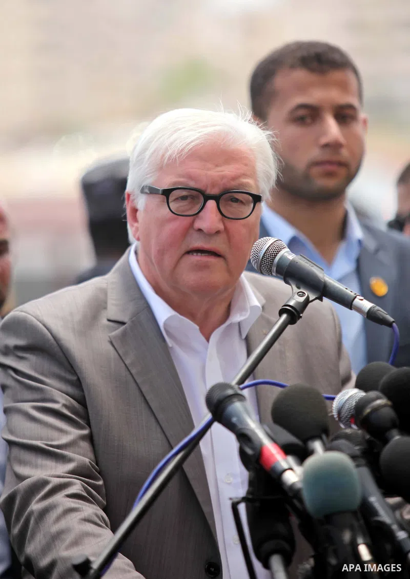 German Foreign Minister Frank-Walter Steinmeier speaks to media following his visit to destroyed rooms of Palestinian fishermen, damaged during Israeli Hamas conflict of 2014, in Gaza port, during his visit to Gaza City,...