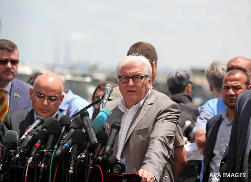 German Foreign Minister Frank-Walter Steinmeier speaks to media following his visit to destroyed rooms of Palestinian fishermen, damaged during Israeli Hamas conflict of 2014, in Gaza port, during his visit to Gaza City,...