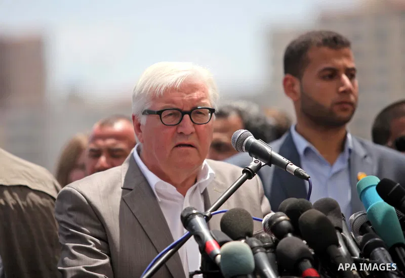German Foreign Minister Frank-Walter Steinmeier speaks to media following his visit to destroyed rooms of Palestinian fishermen, damaged during Israeli Hamas conflict of 2014, in Gaza port, during his visit to Gaza City,...