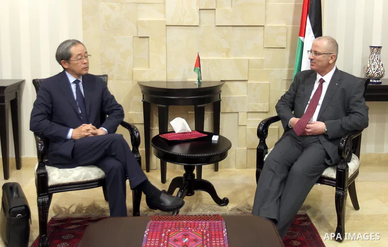 Palestinian Prime Minister Rami Hamdallah meets with Japanese envoy to the Middle East Masahiro Chono, in the West Bank city of Ramallah on June 1, 2015. Photo by Prime Minister Office