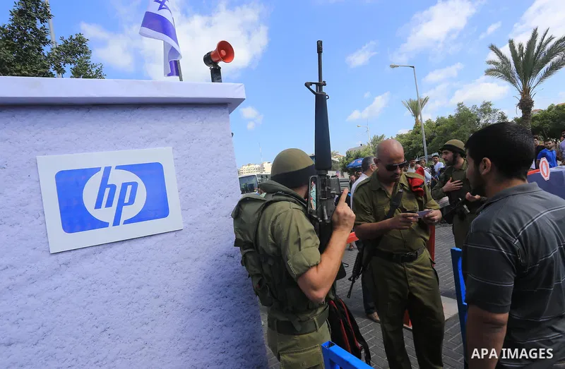 Palestinian youths take part in a theatrical presentation depicts the Israeli checkpoints in the West Bank, in Gaza city on June 2, 2015. Photo by Mohammed Asad