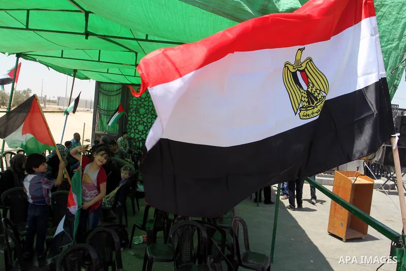 Palestinians take part in a protest demanding opening Rafah crossing border between Egypt and Gaza Strip, in Rafah in the southern Gaza Strip on June 2, 2015. Egyptian authorities opened the Rafah crossing last week for...