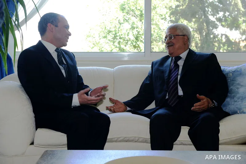 Palestinian President Mahmoud Abbas meets with Jordan's Prince Ali bin al-Hussein in Amman on June 2, 2015. Sepp Blatter won the FIFA presidency last week when his challenger, the Jordanian Prince, withdrew after the fir...