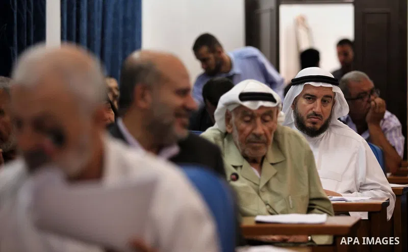 Members of the Palestinian legislative council from Hamas movement attend a meeting at the legislative council in Gaza city on June 03, 2015. Photo by Ashraf Amra