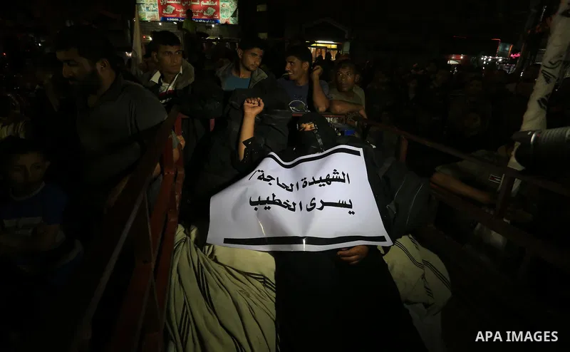 Palestinian Hamas supporters take part in a protest against the Israeli-Egyptian blockade on the Gaza Strip and demanding opening Rafah crossing border, in Khan Younis in the southern Gaza Strip on June 3, 2015. Photo by...