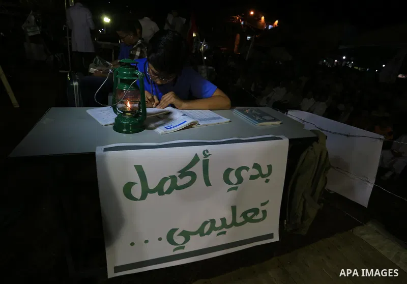 Palestinian Hamas supporters take part in a protest against the Israeli-Egyptian blockade on the Gaza Strip and demanding opening Rafah crossing border, in Khan Younis in the southern Gaza Strip on June 3, 2015. Photo by...