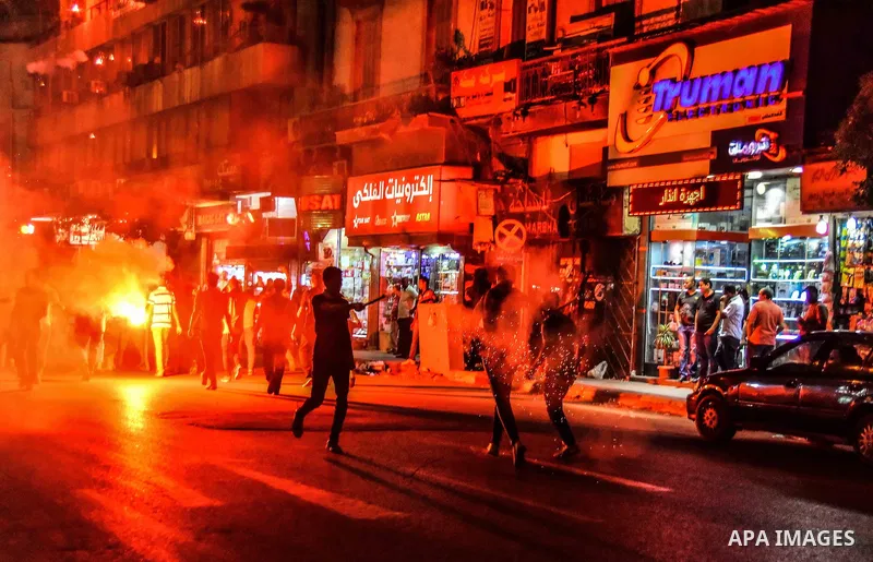 Egyptian youths who support ousted President Mohamed Morsi and the Muslim Brotherhood take part in a protest against killing of their fellow, in Cairo, on June 3, 2015. Photo by Stringer