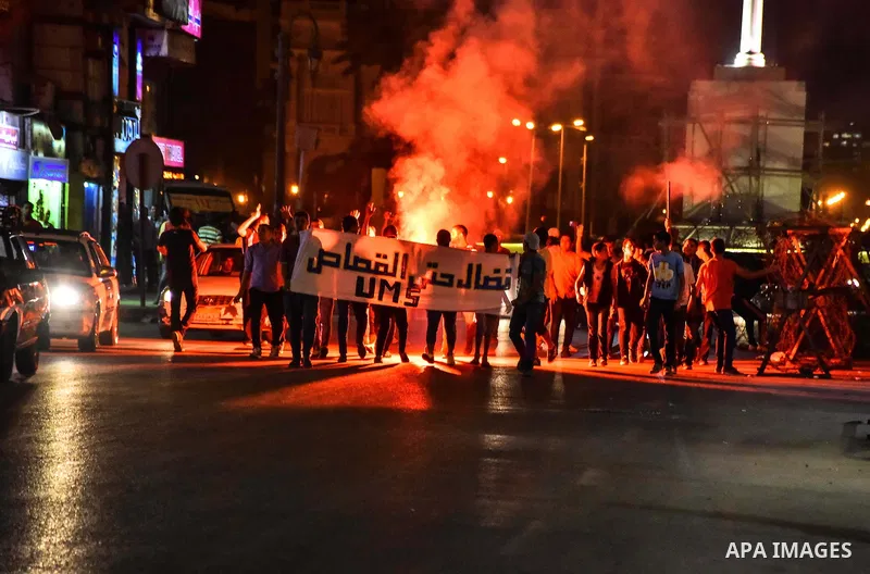 Egyptian youths who support ousted President Mohamed Morsi and the Muslim Brotherhood take part in a protest against killing of their fellow, in Cairo, on June 3, 2015. Photo by Stringer