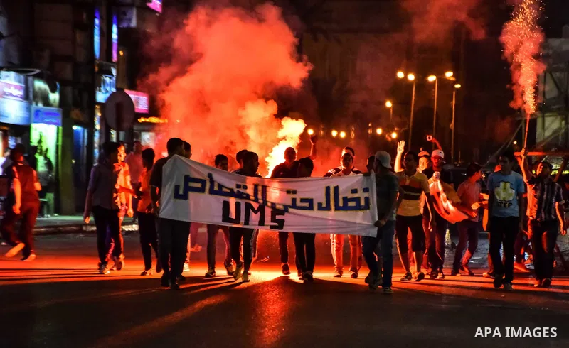 Egyptian youths who support ousted President Mohamed Morsi and the Muslim Brotherhood take part in a protest against killing of their fellow, in Cairo, on June 3, 2015. Photo by Stringer