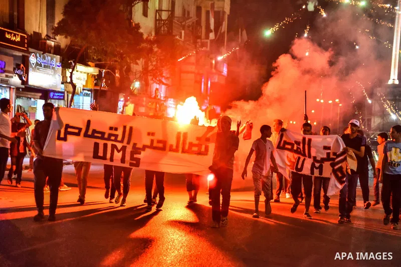 Egyptian youths who support ousted President Mohamed Morsi and the Muslim Brotherhood take part in a protest against killing of their fellow, in Cairo, on June 3, 2015. Photo by Stringer