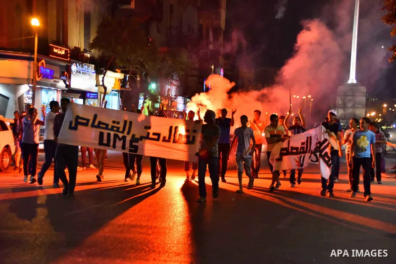Egyptian youths who support ousted President Mohamed Morsi and the Muslim Brotherhood take part in a protest against killing of their fellow, in Cairo, on June 3, 2015. Photo by Stringer