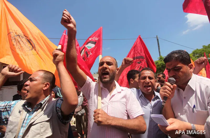 Palestinians take part in a demonstration to mark Naksa Day (setback), in front of the United Nations headcuarter in Gaza city on June 04, 2015. Palestinians mark "Naksa Day" to mourn the 48th anniversary of Israel's occ...