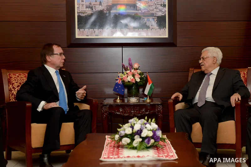 Palestinian President Mahmoud Abbas meets with New Zealand Foreign Minister Murray McCully, in the West Bank city of Ramallah on June 4, 2015. Photo by Thaer Ganaim