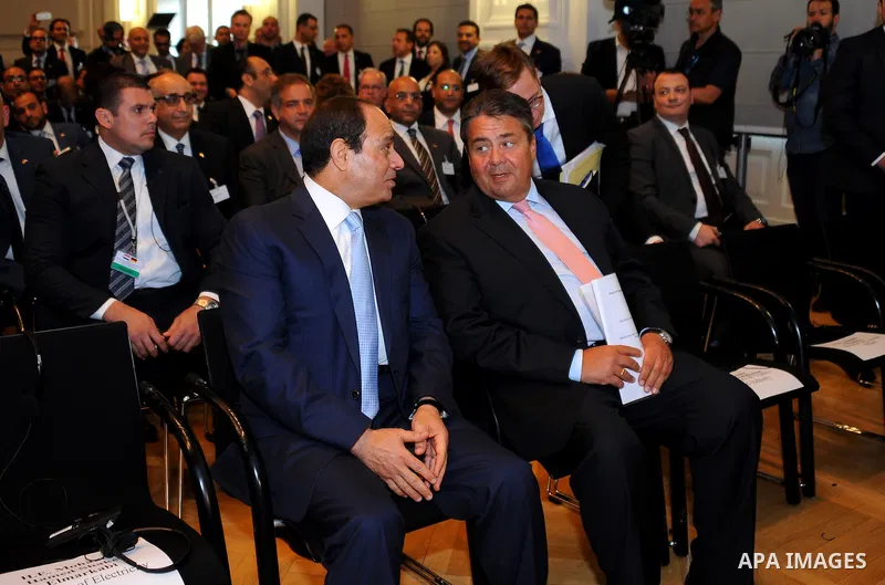 Egyptian President Abdel Fattah al-Sisi (L) and German Vice Chancellor, Economy and Energy Minister Sigmar Gabriel sit next to each other during the second session of the German-Egyption Joint Economic Committee on June...